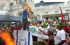 Protestors burning Israeli flag at Sultan Abu Bakar mosque, Johor Bharu